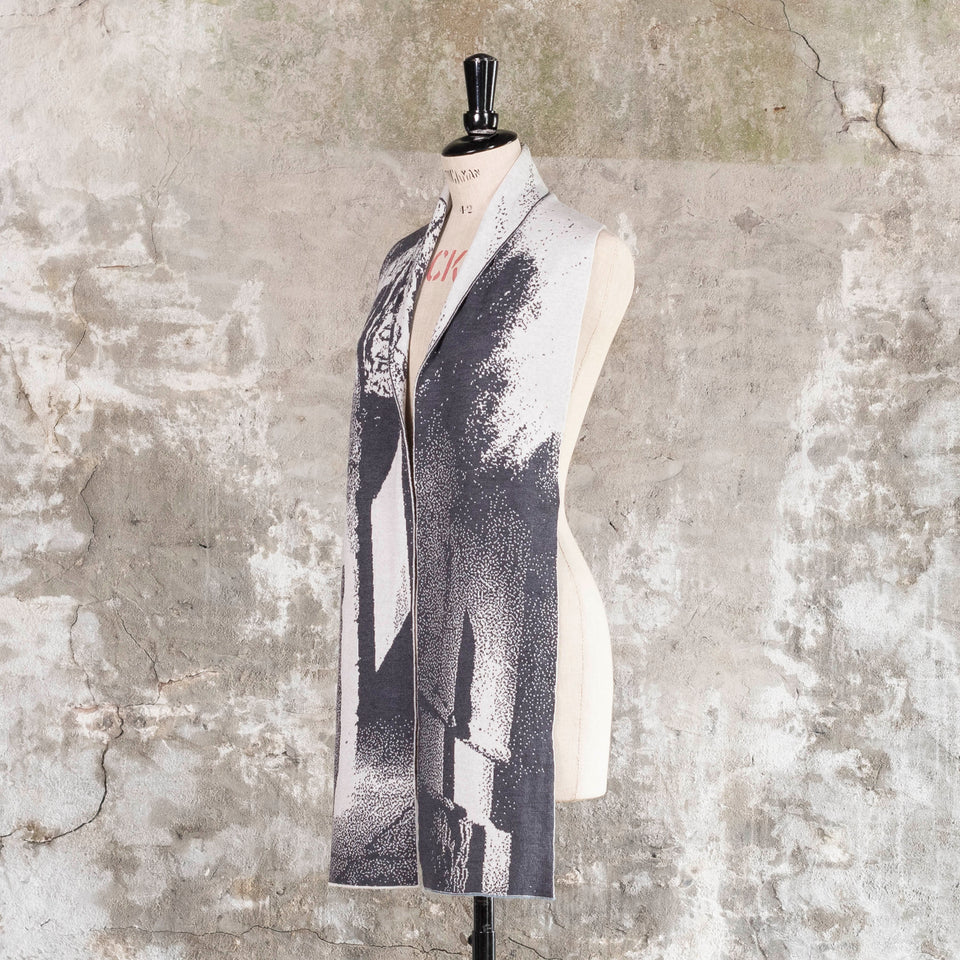 Knitted Byre scarf. Abstract, graphic design in an asymmetric shape. Shown in Charcoal and stone white