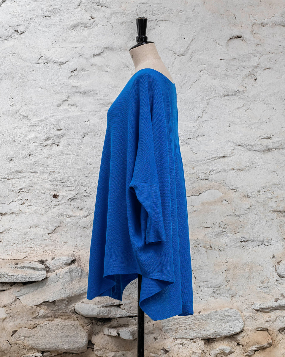 Knitted Saand jumper. contemporary sweater design in a boxy but flowing shape. Flat colour in a textured stitch. Shown in bright blue