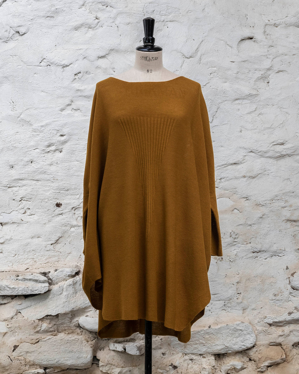 Knitted Saand jumper. contemporary sweater design in a boxy but flowing shape. Flat colour in a textured stitch. Shown in bronze