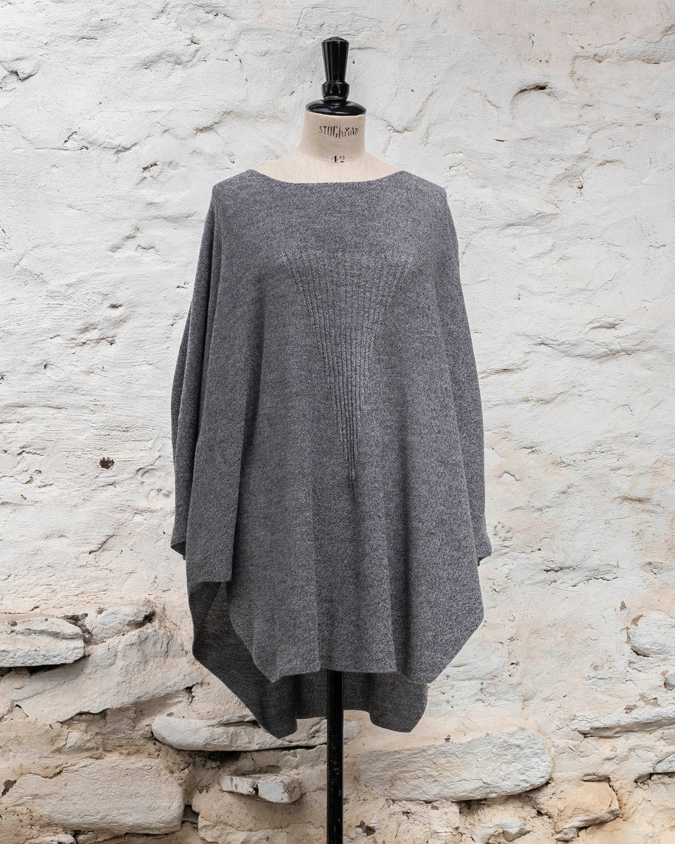 Knitted Saand jumper. Boxy but flowing shape. Flat colour in a textured stitch. Shown in grey