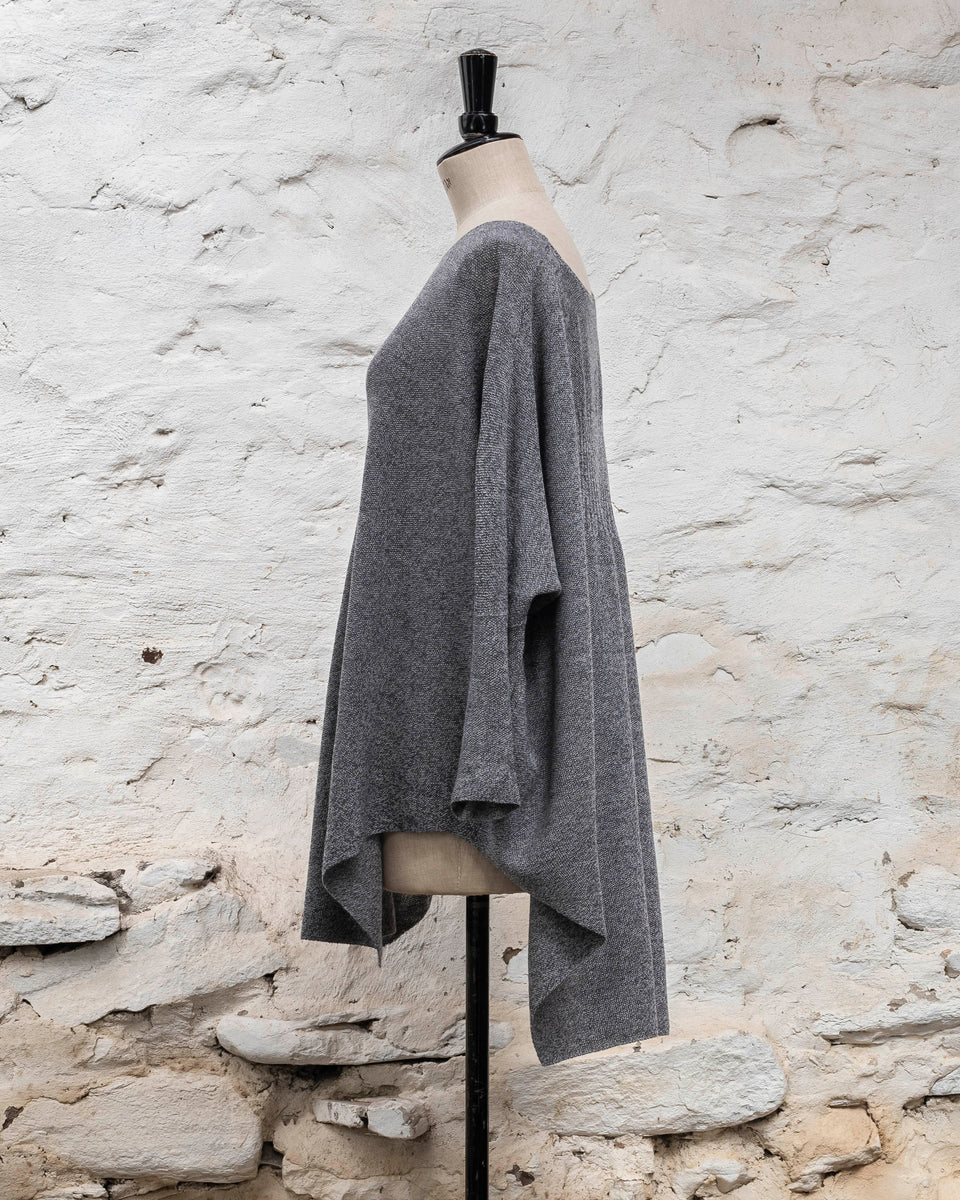 Knitted Saand jumper. contemporary sweater design in a boxy but flowing shape. Flat colour in a textured stitch. Shown in grey