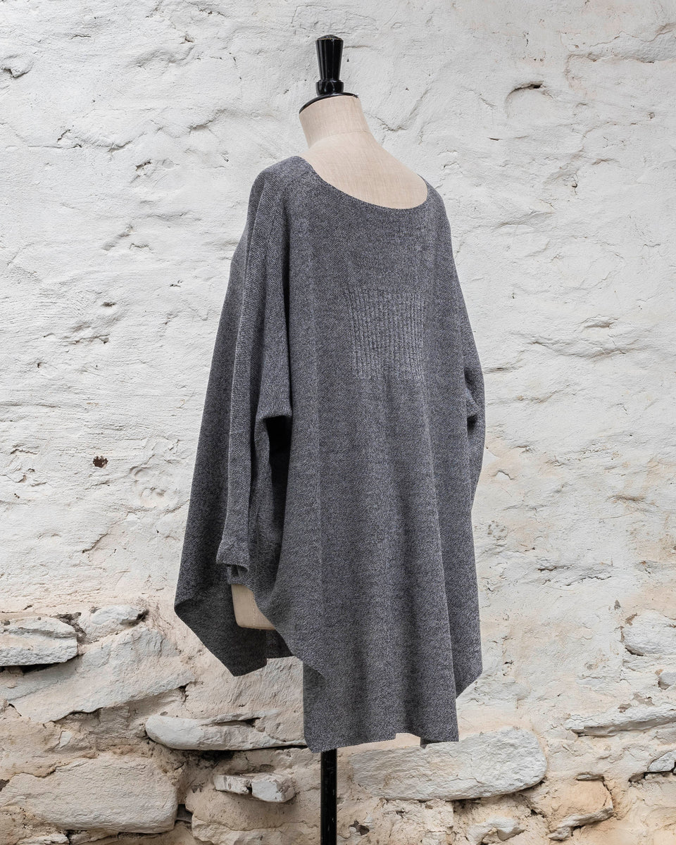 Knitted Saand jumper. contemporary sweater design in a boxy but flowing shape. Flat colour in a textured stitch. Shown in grey