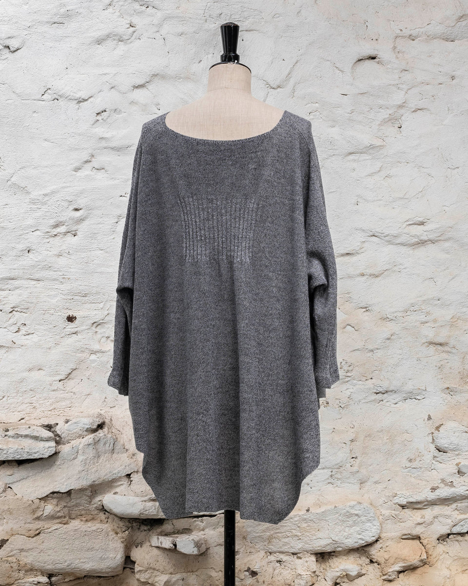 Knitted Saand jumper. contemporary sweater design in a boxy but flowing shape. Flat colour in a textured stitch. Shown in grey