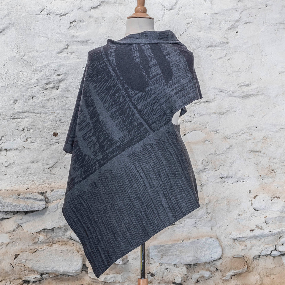 knitted inklines long squint cape. abstract, linear pattern. Shown in midnight greys