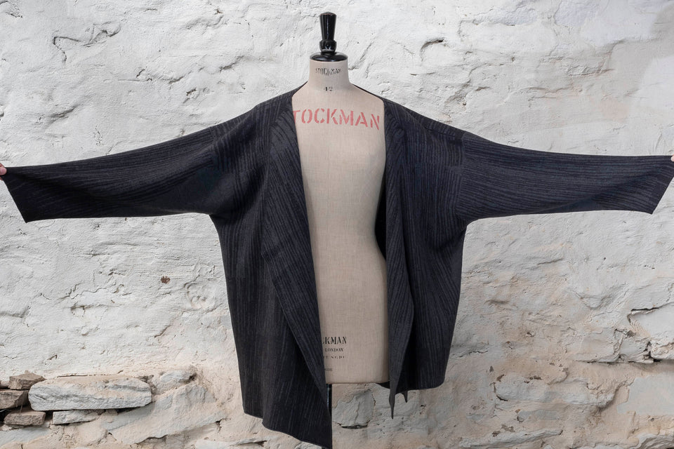 Knitted inklines jacket coatigan abstract, linear pattern. Shown in midnight greys