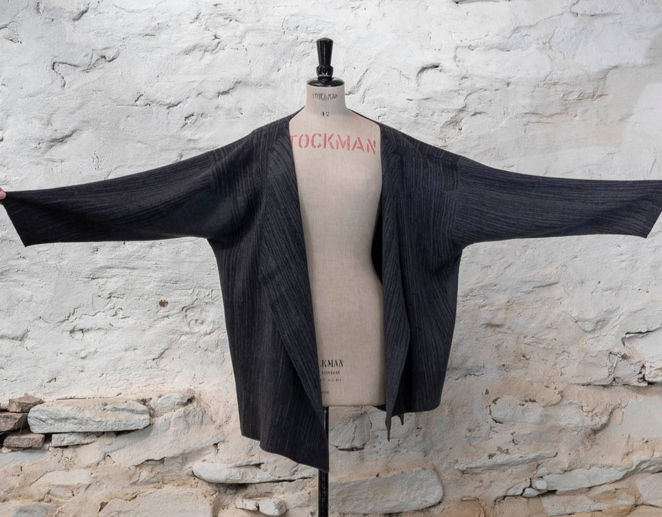 Knitted inklines jacket coatigan abstract, linear pattern. Shown in midnight greys