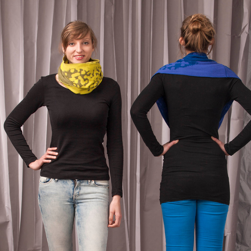 marlet twist scarf. mottled abstract animal print pattern, two shown in yellows and blues