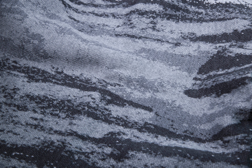 Close up of sea greys in finely knitted shawl