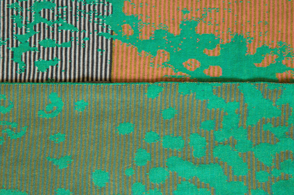 Marlet scarf swatch. Stripes break up the mottled animal print fabric. Shown in light sea mix