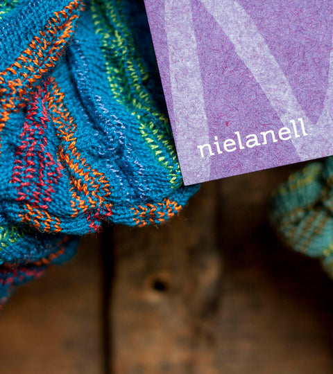 Close up of Scottish Knitwear by Nielanell Shetland, with label