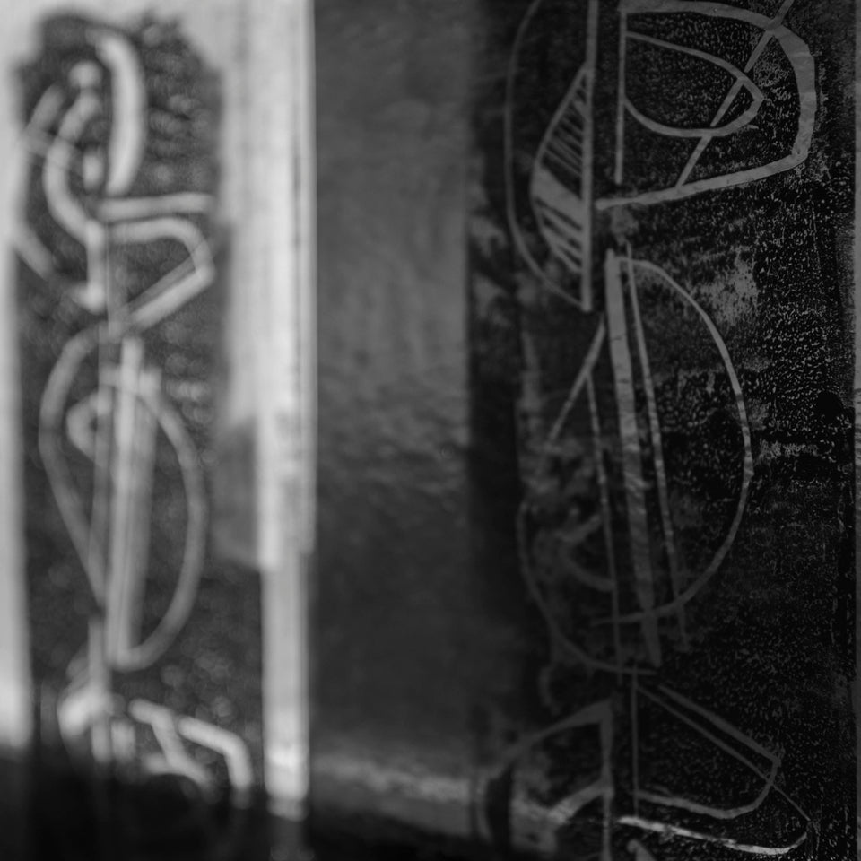Abstract mono prints on glass, with light coming from behind