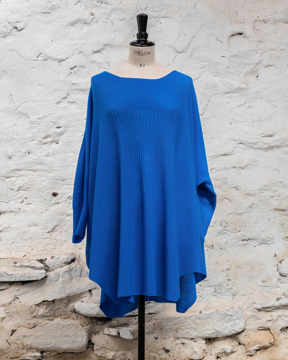 Knitted Saand jumper. contemporary sweater design in a boxy but flowing shape. Flat colour in a textured stitch. Shown in bright blue