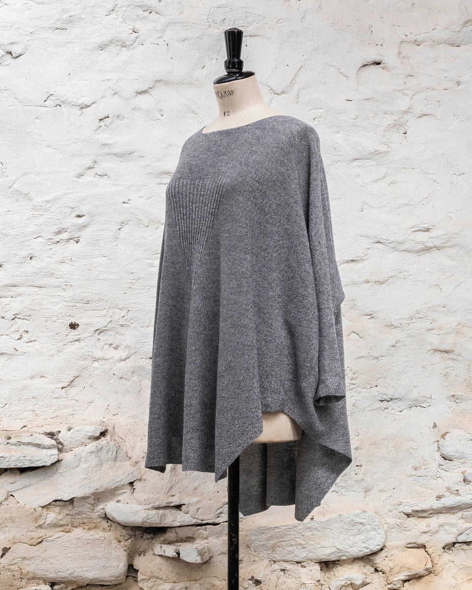 Knitted Saand jumper. contemporary sweater design in a boxy but flowing shape. Flat colour in a textured stitch. Shown in grey