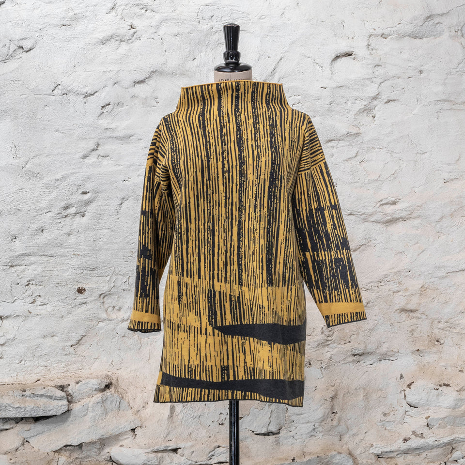 knitted inklines tunic, a straight cut longline jumper with stand-up neck. Linear, abstract design. Here shown in colourway sunlight yellow
