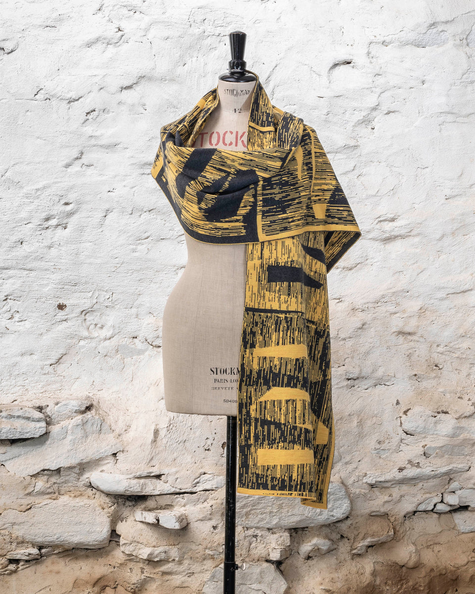 knitted inklines scarf. abstract, linear pattern shown in yellow and grey