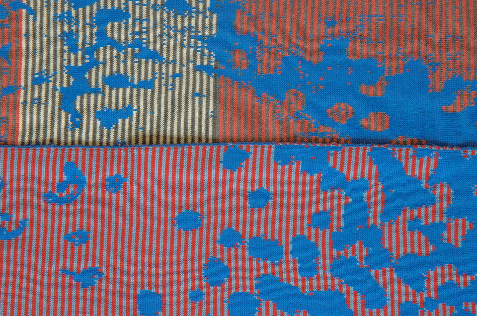 Marlet scarf swatch. Stripes break up the mottled animal print fabric. Shown in bright blue mix