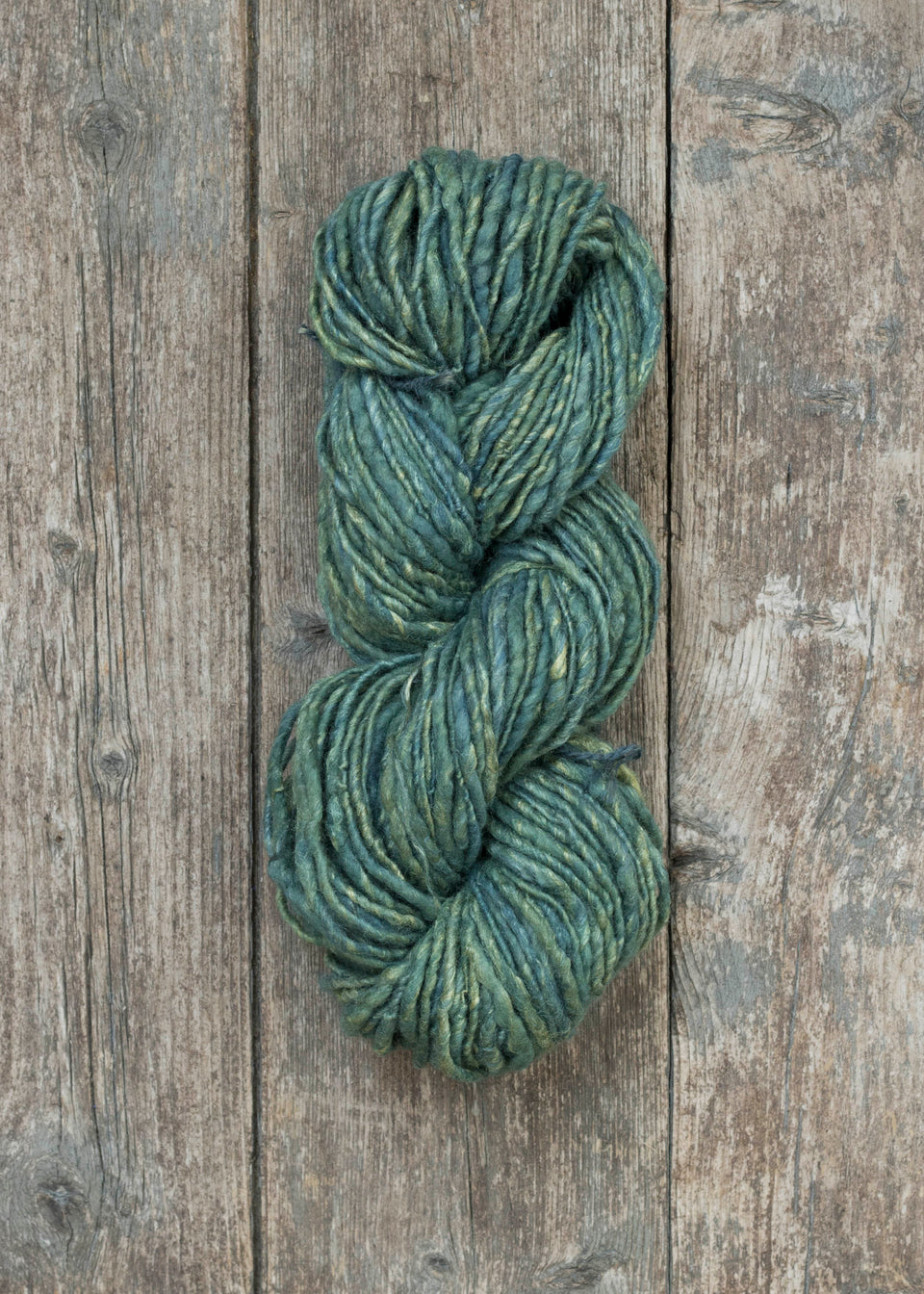 handspun, hand-dyed indigo art yarn. shetland wool, linen, tussah silk